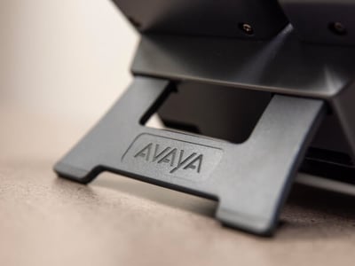 Close-up of the stand for an Avaya J169 desk phone